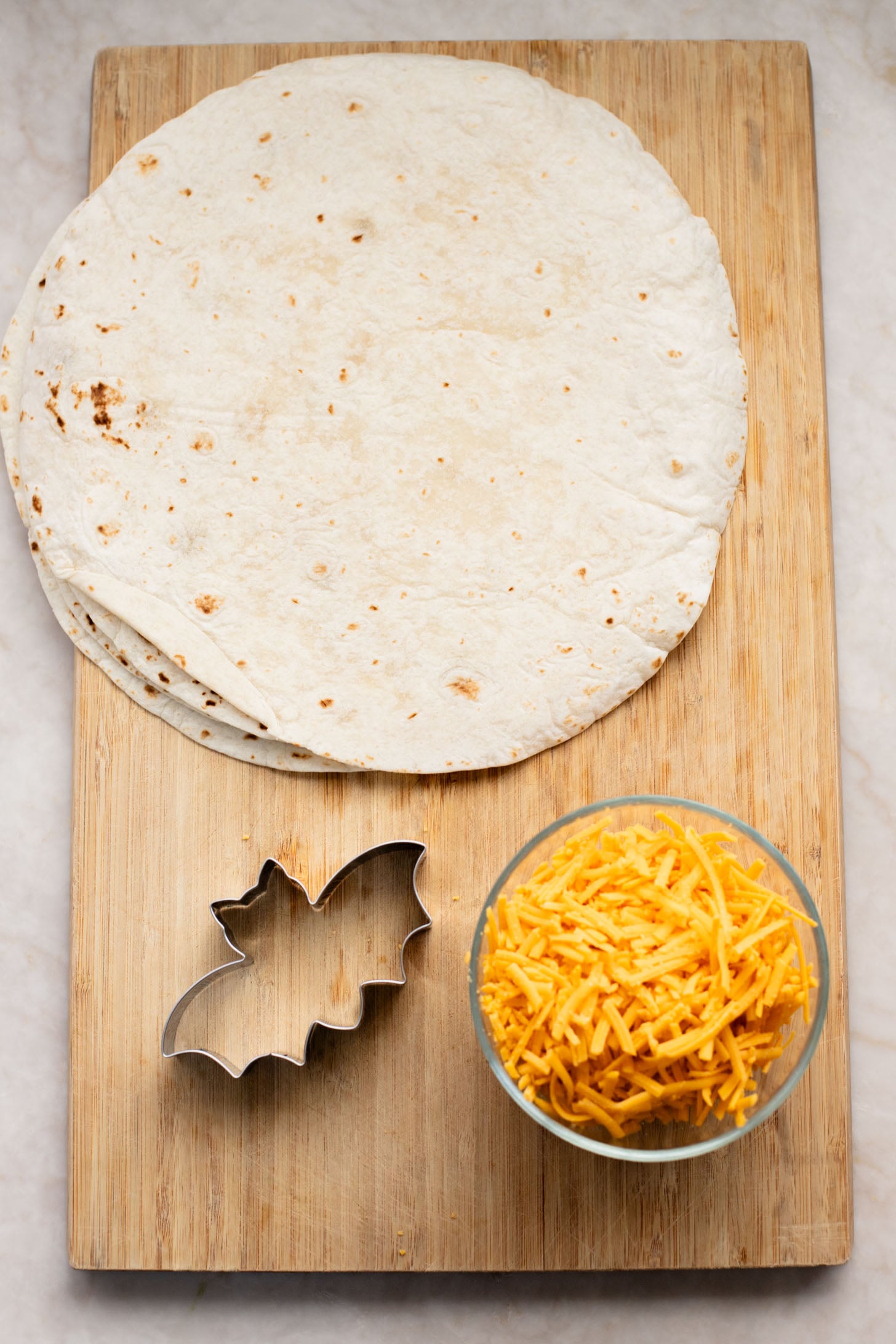 These Bat Shaped Vegan Quesadillas are the perfect kid-friendly Halloween recipe. Simple flavors and so much fun to make | ThisSavoryVegan.com