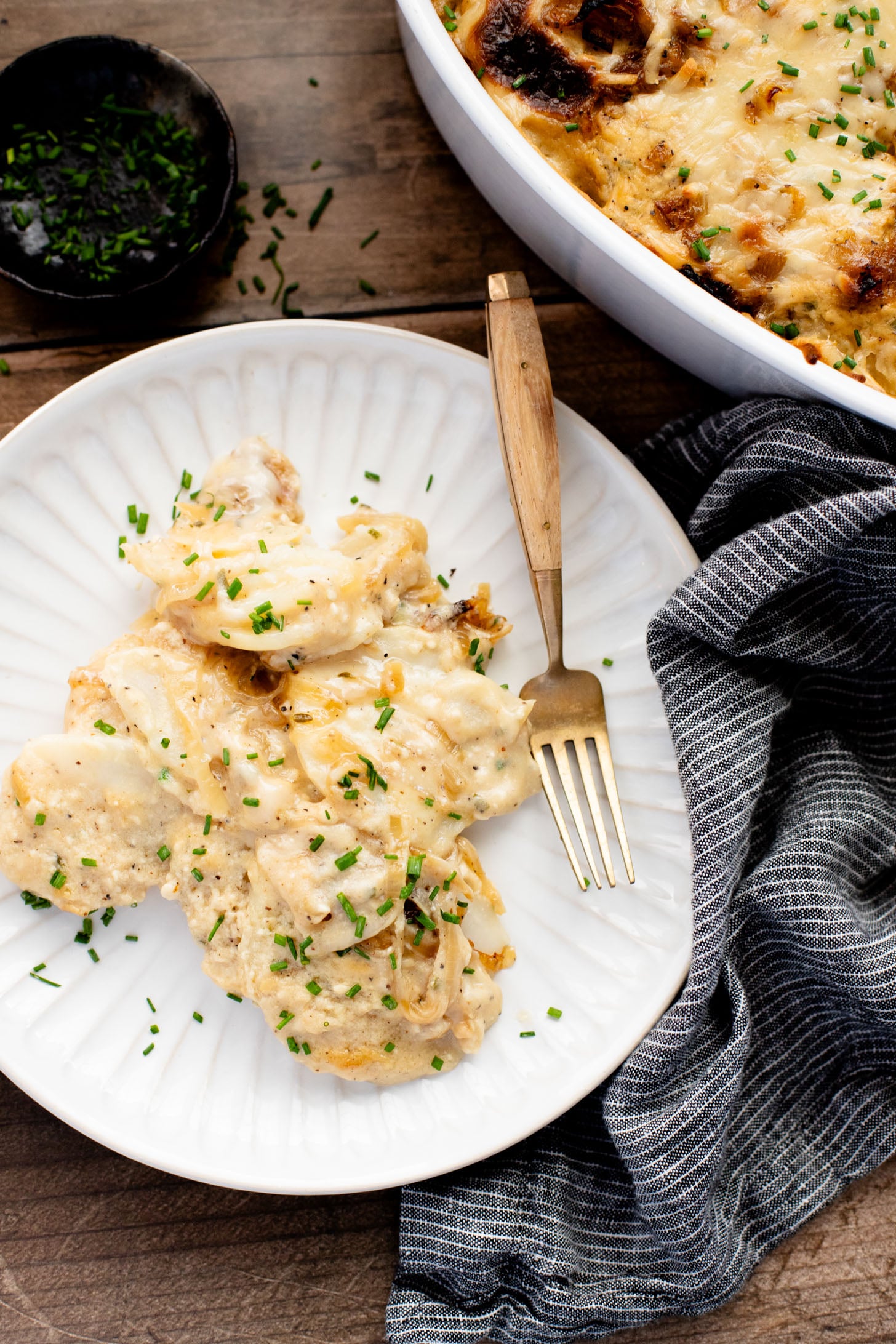 These French Onion Scalloped Potatoes are the perfect vegan holiday side dish. Dairy-free, but you'd never know it | ThisSavoryVegan.com