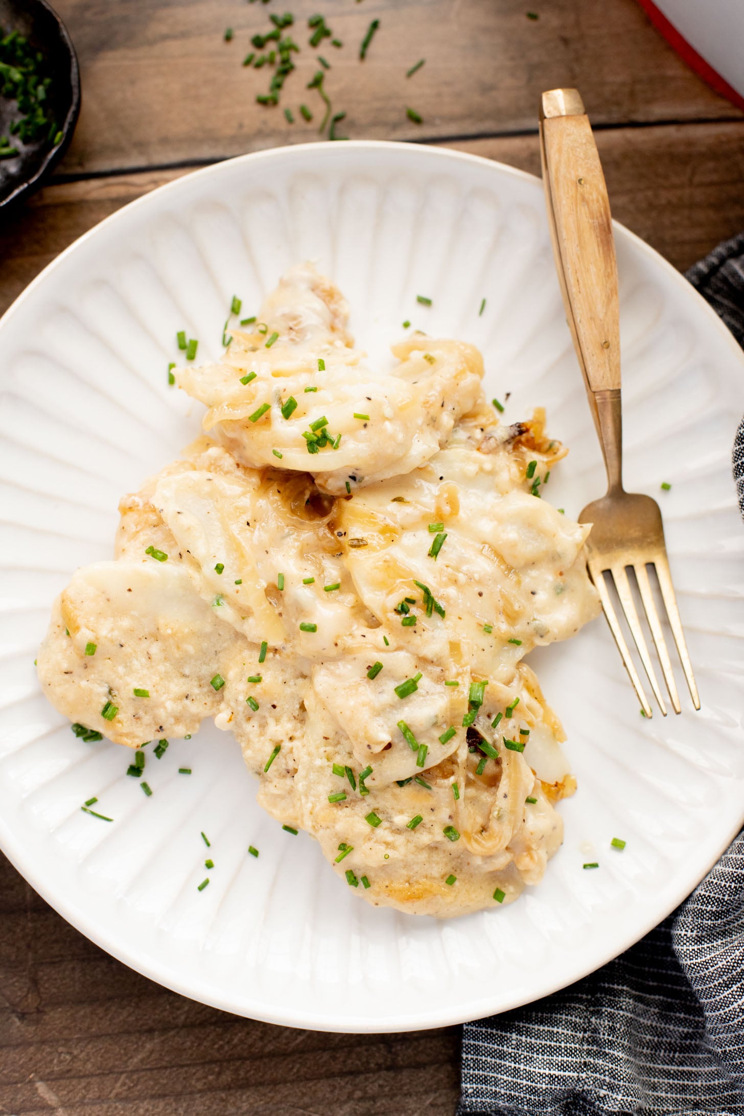 These French Onion Scalloped Potatoes are the perfect vegan holiday side dish. Dairy-free, but you'd never know it | ThisSavoryVegan.com
