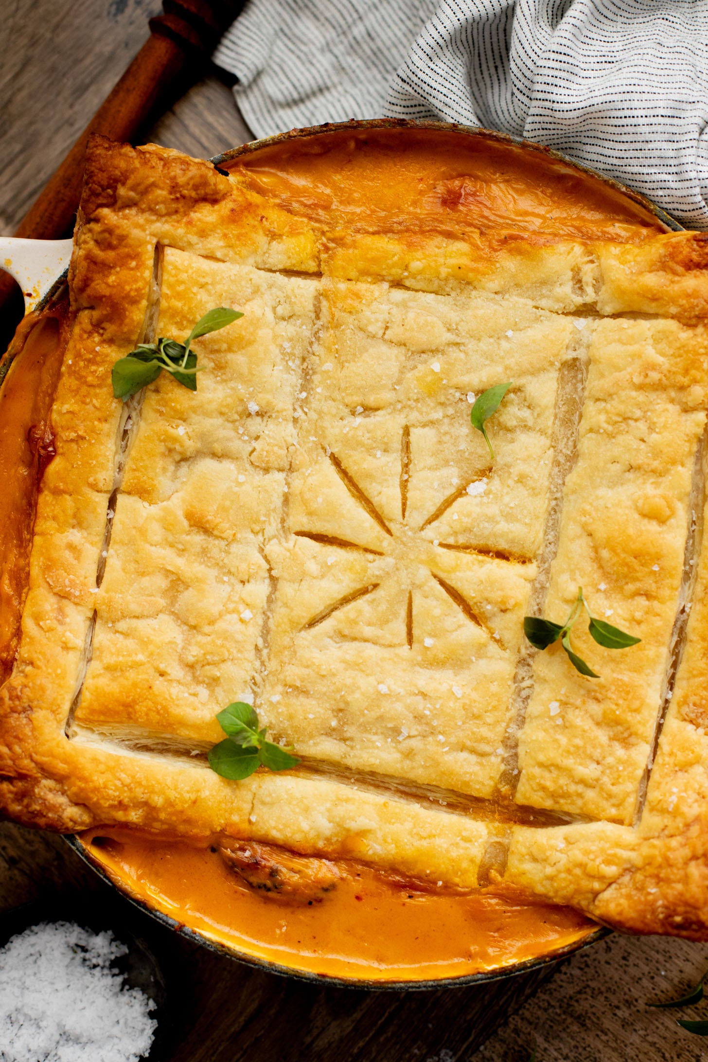 This Red Curry Butternut Squash Pot Pie is veggie-packed comfort food. Tender veggies, chickpeas and a delicious coconut curry sauce | ThisSavoryVegan.com