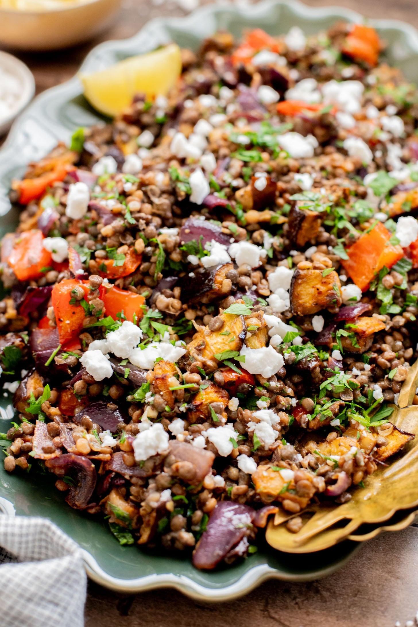 This Roasted Veggie Lentil Salad is filled with eggplant, bell pepper, onions, fresh herbs, lentils, vegan feta & a light, tangy dressing | ThisSavoryVegan.com