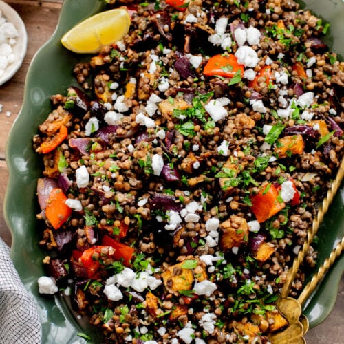 This Roasted Veggie Lentil Salad is filled with eggplant, bell pepper, onions, fresh herbs, lentils, vegan feta & a light, tangy dressing | ThisSavoryVegan.com