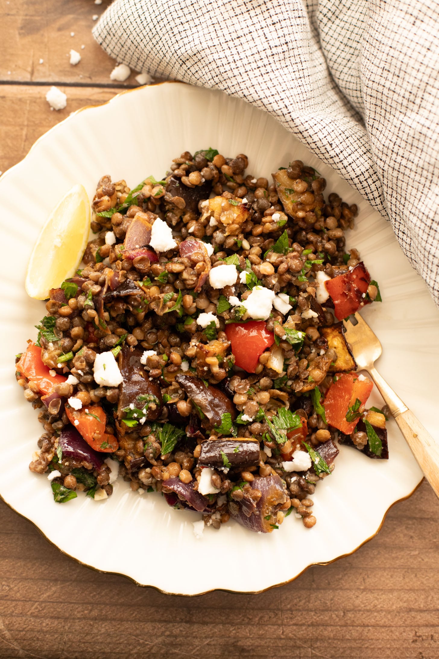 This Roasted Veggie Lentil Salad is filled with eggplant, bell pepper, onions, fresh herbs, lentils, vegan feta & a light, tangy dressing | ThisSavoryVegan.com