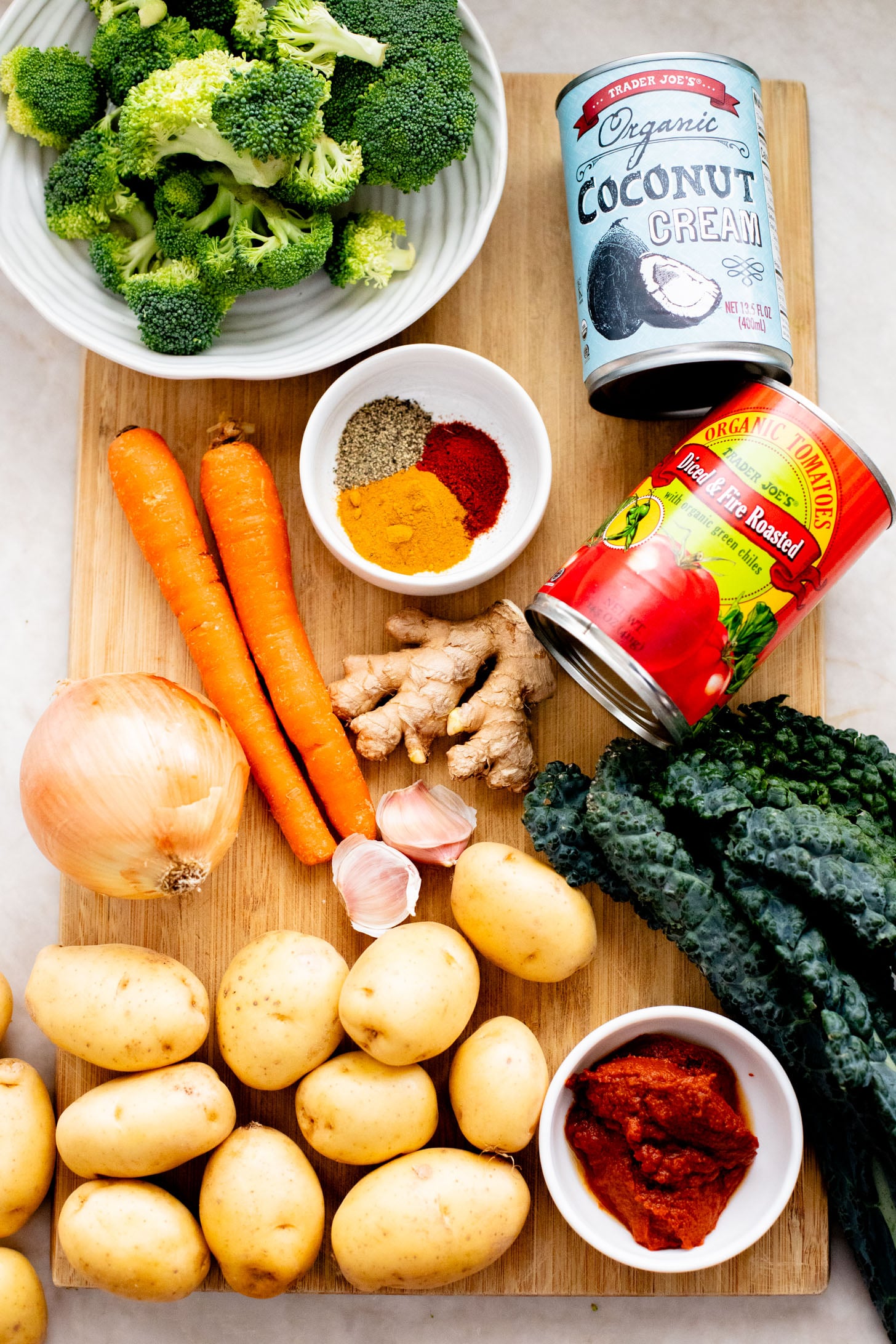 This Slow Cooker Red Curry Potato Soup is packed with veggies and the most delicious coconut broth. The perfect dairy-free soup | ThisSavoryVegan.com