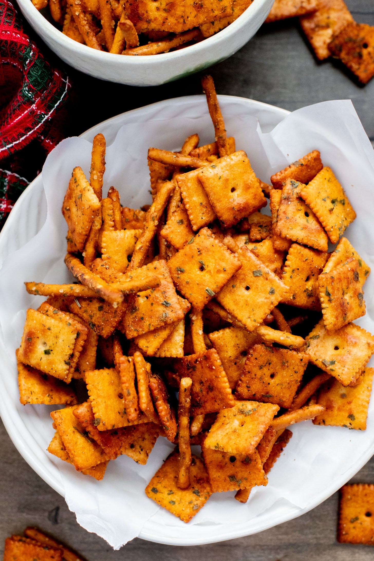 This Vegan Holiday Snack Mix is so addicting. Made with dairy-free cheese crackers, pretzels and the best seasoning blend | ThisSavoryVegan.com