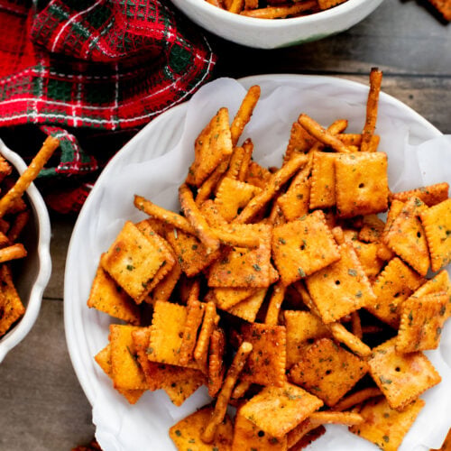 This Vegan Holiday Snack Mix is so addicting. Made with dairy-free cheese crackers, pretzels and the best seasoning blend | ThisSavoryVegan.com