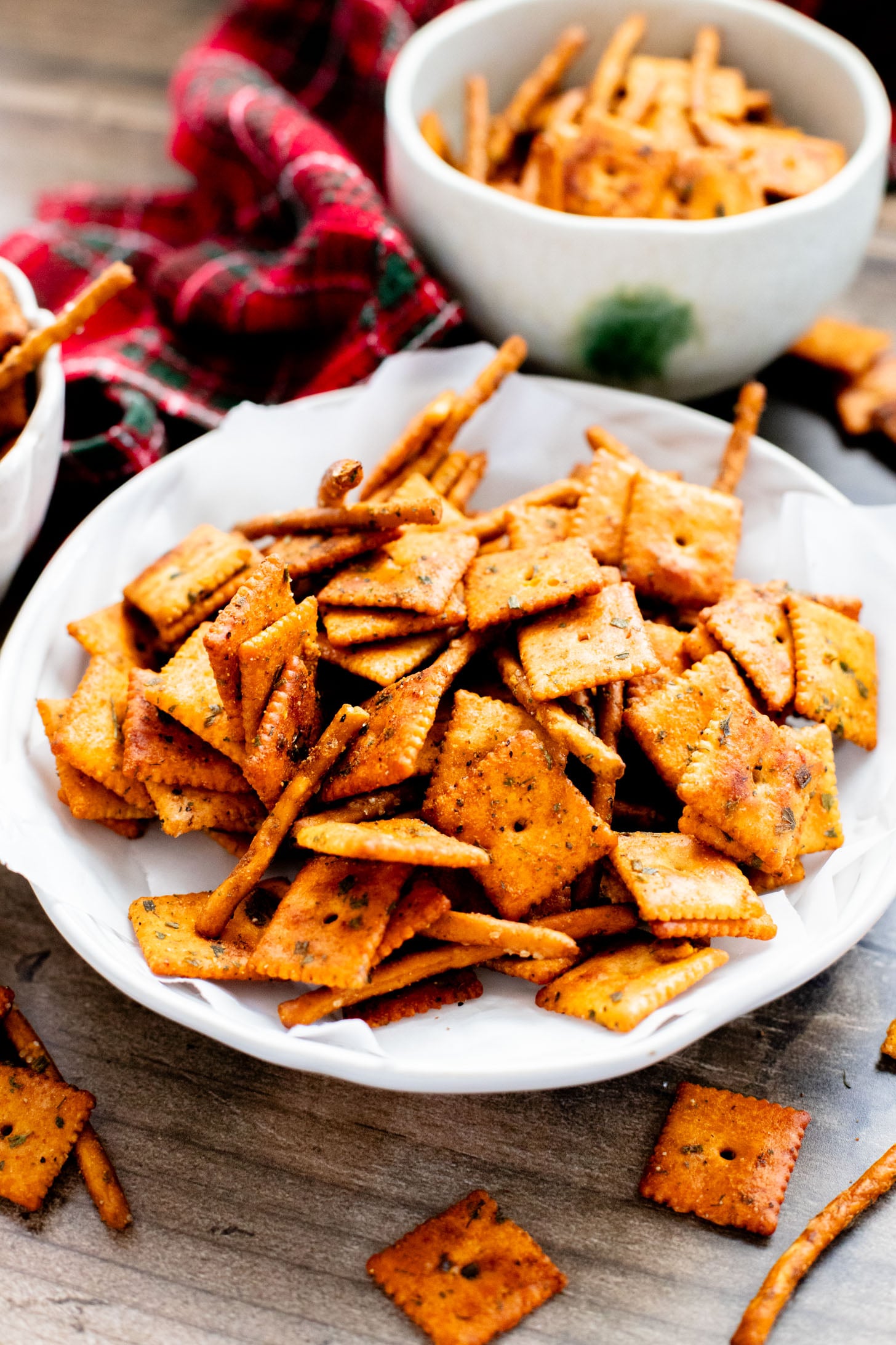 This Vegan Holiday Snack Mix is so addicting. Made with dairy-free cheese crackers, pretzels and the best seasoning blend | ThisSavoryVegan.com