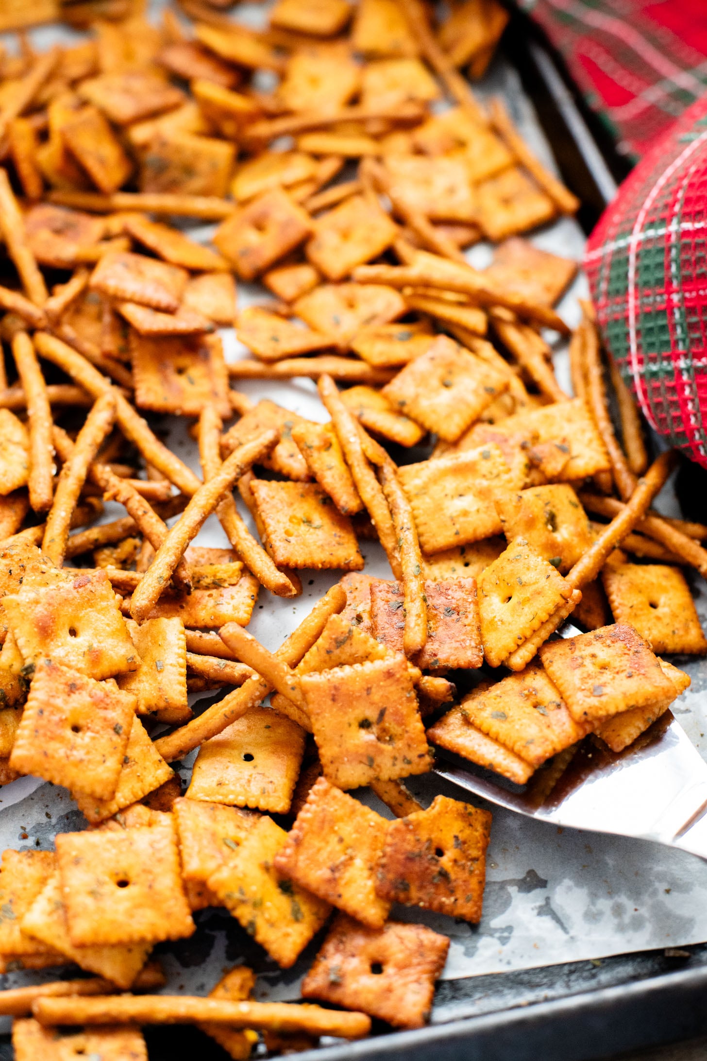 This Vegan Holiday Snack Mix is so addicting. Made with dairy-free cheese crackers, pretzels and the best seasoning blend | ThisSavoryVegan.com